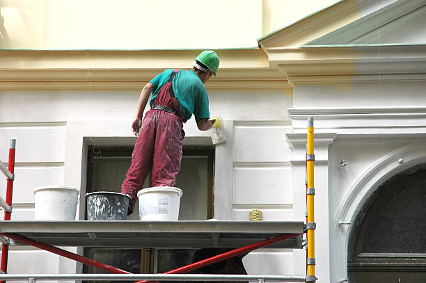 What types of surfaces can be painted by Tacoma industrial painting services?